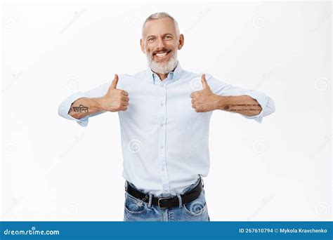 Smiling Mature Guy Businessman Showing Thumbs Up In Approval