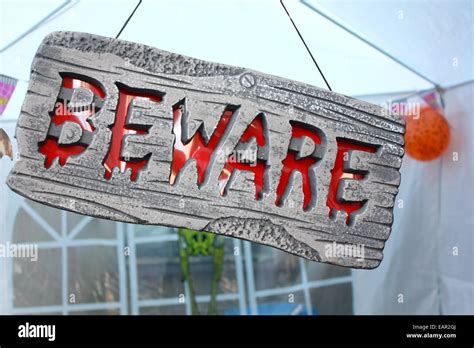 Beware, a scary sign Stock Photo - Alamy