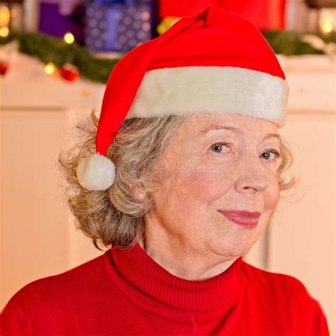 Retired Woman Father Christmas Hat Stock Image Image Of Festive