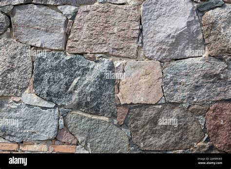 Stone Wall With Different Colors And Size Of Rocks Stock Photo Alamy