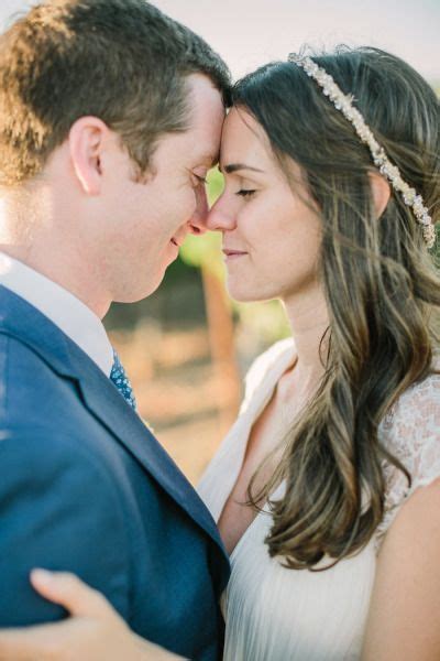 A Bride And Groom Embracing Each Other