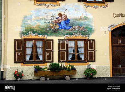 Painted facades with frescoes of typical houses in Mittenwald, Bavaria ...