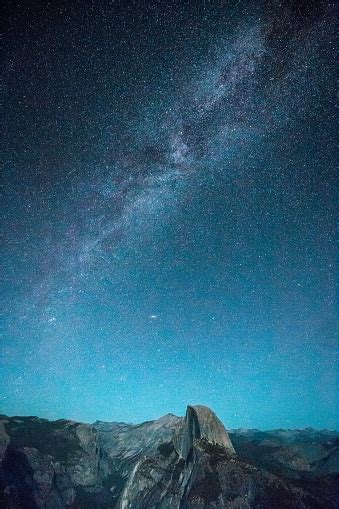 Starry Night Sky With Milky Way Above Half Dome Peak Yosemite National