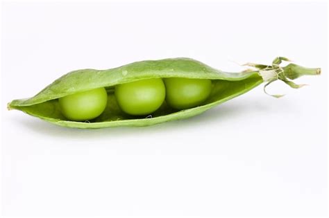 Premium Photo Close Up Of Green Pea On White Background