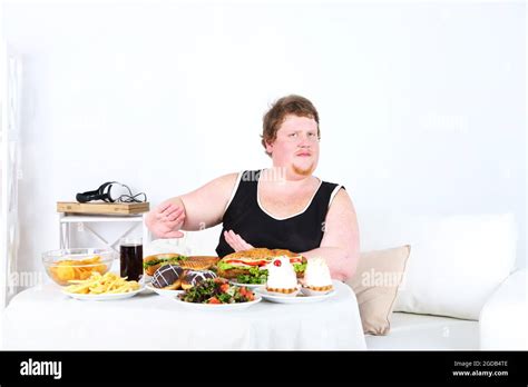 Fat Man Do Not Want To Eat A Lot Of Unhealthy Food On Home Interior