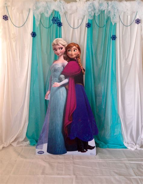 Frozen Photo Booth Made With Table Clothes Hanging From A Pvc Frame