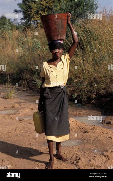 Water Fetching In Babati Tanzania Stock Photo Alamy