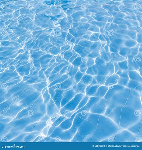 Background Of Rippled Pattern Of Clean Water In A Blue Swimming Stock