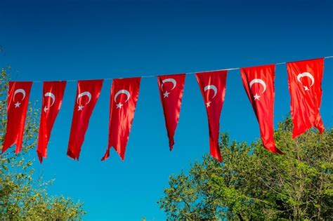 Premium Photo Turkish National Flags With White Star And Moon In Sky