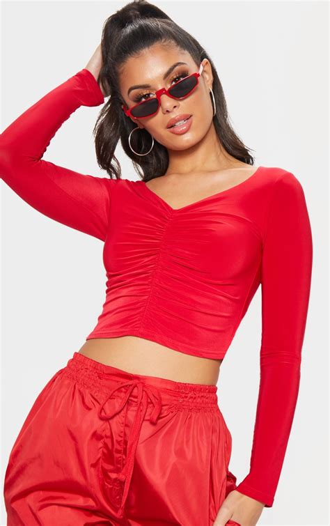 Red Slinky Long Sleeve Ruched Crop Top Tops Prettylittlething Usa