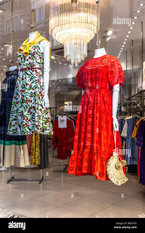 Headless Mannequins Wearing Summer Dresses Hanging Inside A Shop