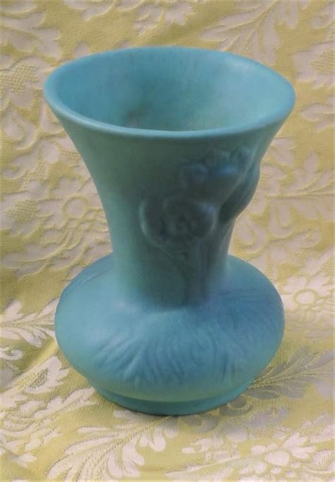 This Mid Century Circa 1940 1950 Molded Crocus Design Vase With Van