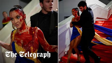 Anti Ukraine War Protester Covers Herself In Fake Blood On Cannes Red