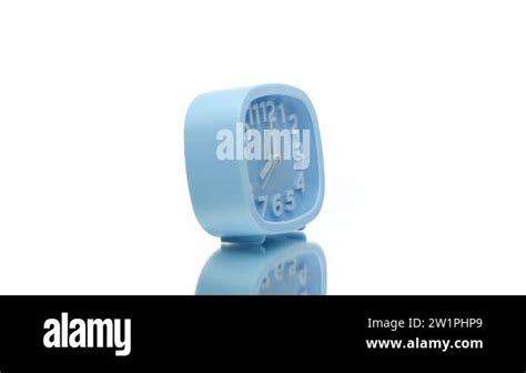 Blue Alarm Clock Showing Eight Oclock Spinning Rotating 360 Isolated On