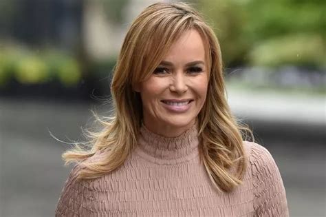 Amanda Holden Flaunts Toned Figure As She Flashes Midriff In Tiny Blue