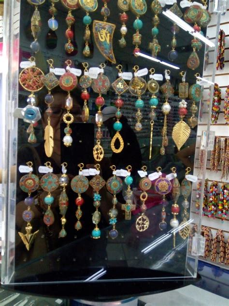 An Assortment Of Earrings On Display In A Store