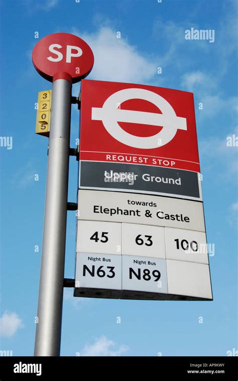 Bus stop sign London England Stock Photo - Alamy