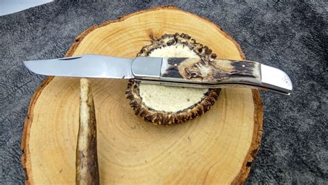 Carved Antler Handled Handmade Pocket Knife In Hand Stitched Leather