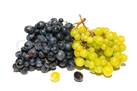 Black and green grapes isolated on ... | Stock image | Colourbox