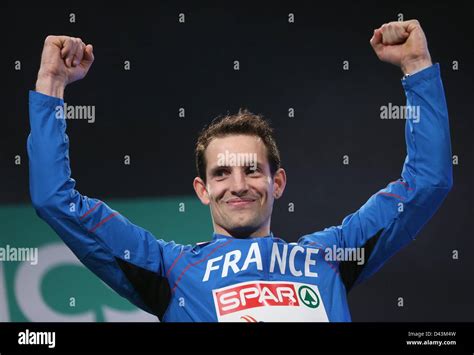 Winner Renaud Lavillenie Of France Celebrates His Gold Medal In The Men