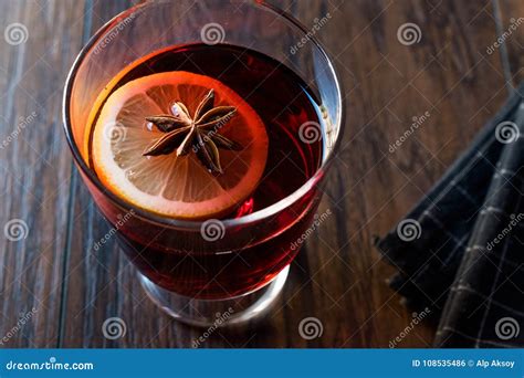 Hot Mulled Wine For Winter Prepared With Anise Spices Cinnamon Sticks And Orange Slice Stock