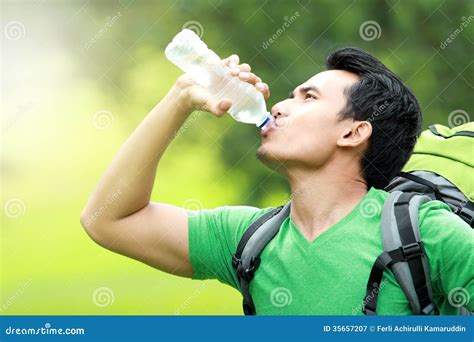 Thirsty Man Drinking A Bottle Of Water Stock Image Image Of Asian