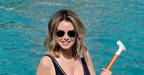 Page 3 Babe Rhian Sugden Pours Cleavage Into Mesh Swimsuit For Paddle