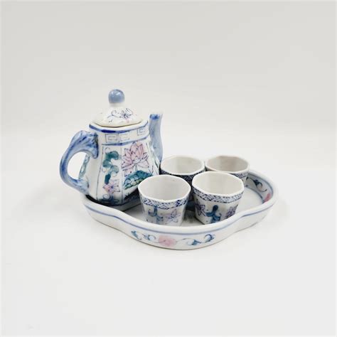 VINTAGE FANTASTIC PORCELAIN TEA SET | EstateSales.org