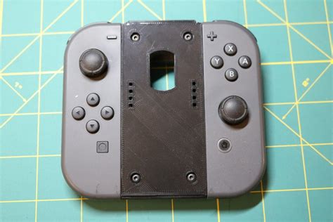 Archivo STL gratis Empuñadura de 2 piezas para el joycon de Nintendo