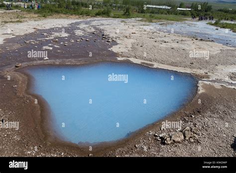 Hot Spring In The Volcanic Landscape Around The Strokkur Geyser In Iceland A Famous Area With
