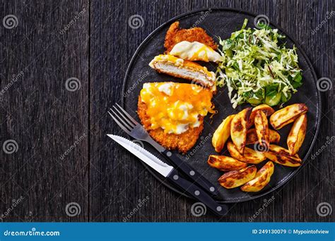 Chicken Parmo with Coleslaw and Roast Potatoes Stock Image - Image of ...