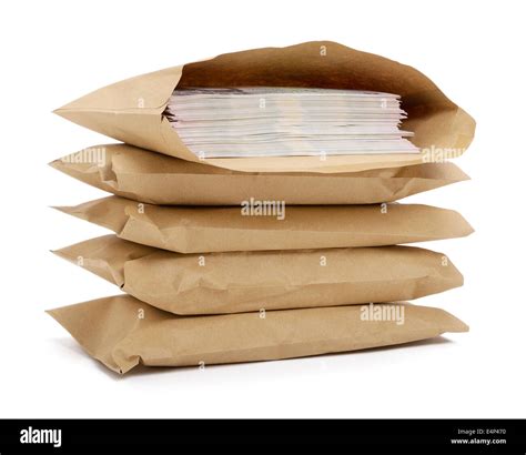 Brown envelopes full of money Stock Photo - Alamy