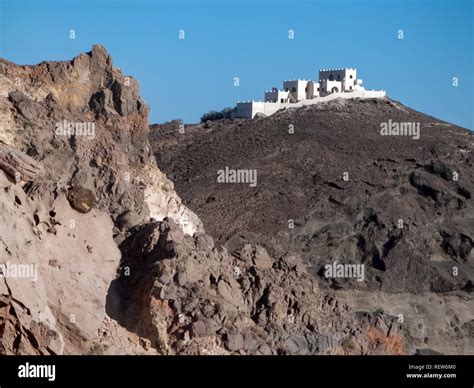 Building On The Rock Clear Blue Sky Background Picturesque View Of