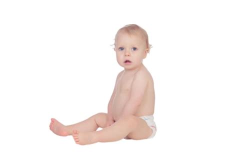 Adorable Blonde Baby In Diaper Sitting On The Floor Stock Photo By