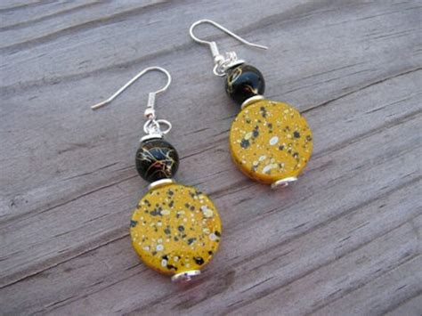 Items Similar To Yellow And Black Beaded Earrings On Etsy