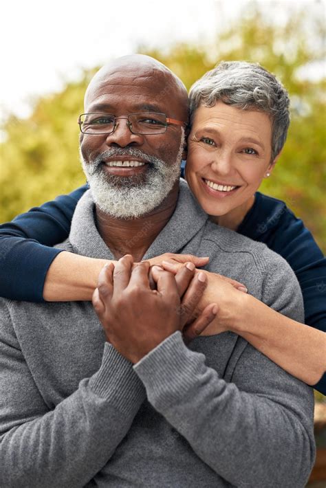 Premium Photo Portrait Park Or Senior Couple With Hug Interracial Or Romantic With Bonding