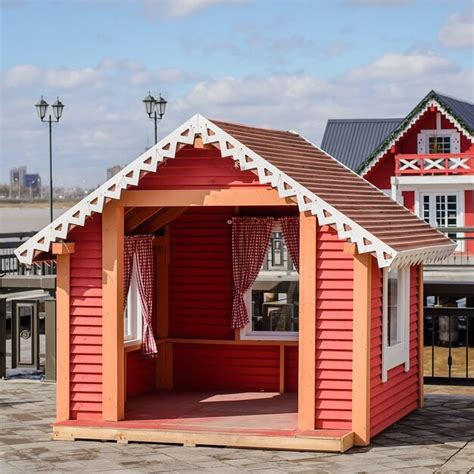 Premium Photo Small Red Wooden House