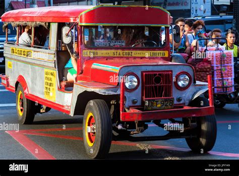 Jeepney And Passengers Manila Philippines Stock Photo Alamy