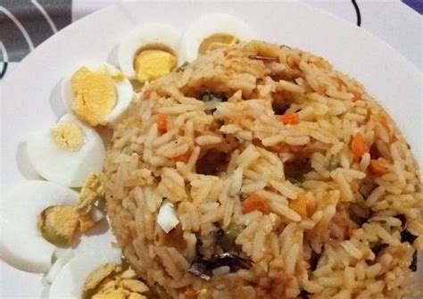 Native Oil Jollof Rice With Boiled Eggs Recipe By Charity Brian Dappa