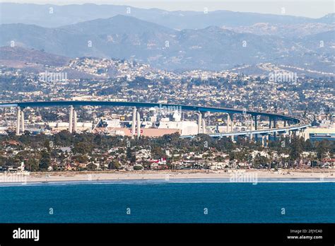 the Coronado Bridge from San Diego to Coronado Island showing shipyards ...