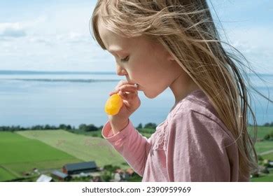 Girl Eating Ice Pop Stock Photos and Pictures - 1,304 Images | Shutterstock