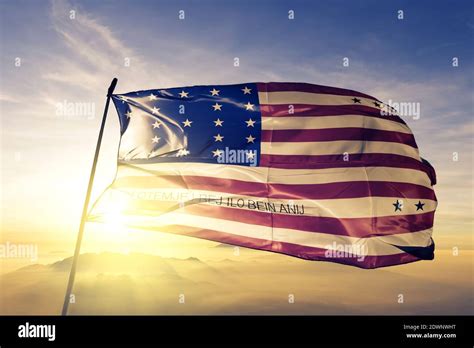 Bikini Atoll Flag Waving On The Top Sunrise Mist Fog Stock Photo Alamy