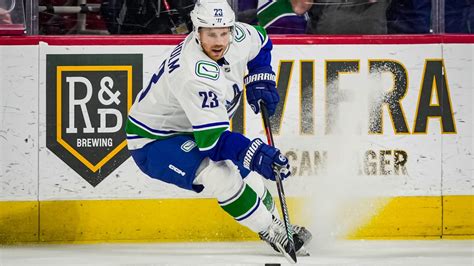 Lindholm Scores Two In Canucks Debut Vancouver Overtakes Carolina