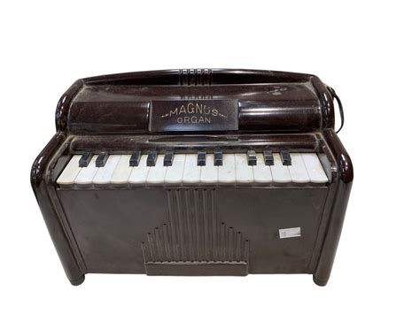 Vintage Magnus Organ Toy