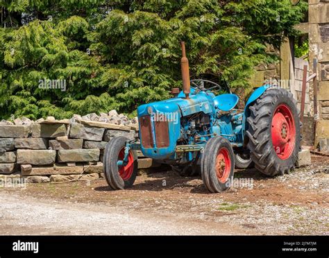 A Fordson Dexta Tractor Cow Ark Clitheroe Lancashire Uk Stock Photo