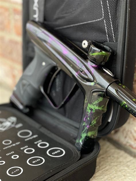 Used Dlx Luxe Ice Paintball Gun Acid Wash Green Purple Punishers Paintball