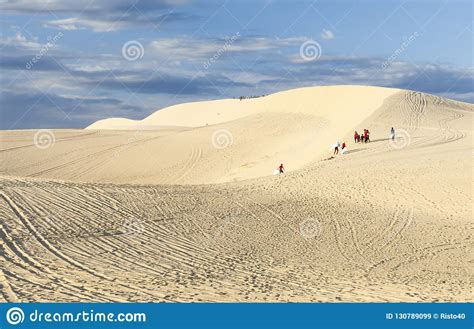 Tourist Walk On Yellow Sand Dunes In Mui Ne Vietnam Editorial Stock