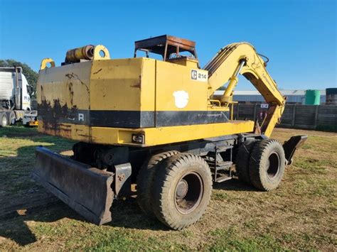 Caterpillar 214 Excavator Truck And Cargo