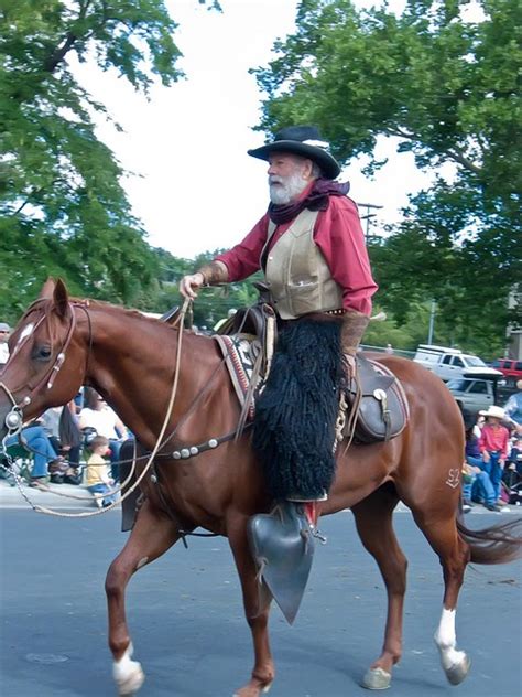 A Cowboy In A Pair Of Woolies Joins The Pendleton Roundup Parade A