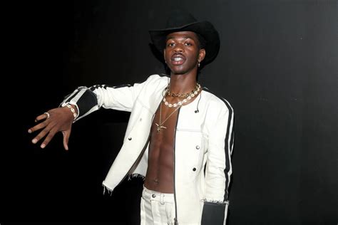 Download Lil Nas X White Cowboy Outfit Wallpaper | Wallpapers.com